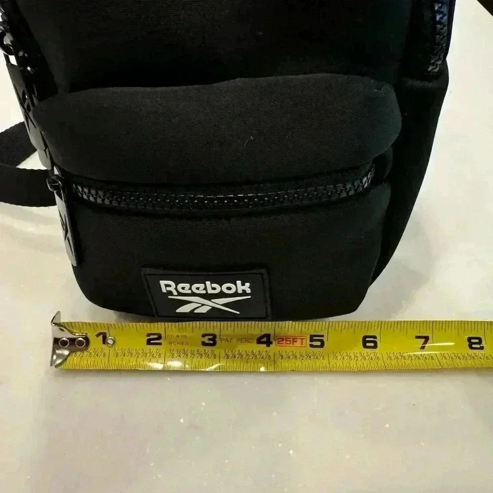 Reebok mini neoprene back pack adjustable straps front zip compartment